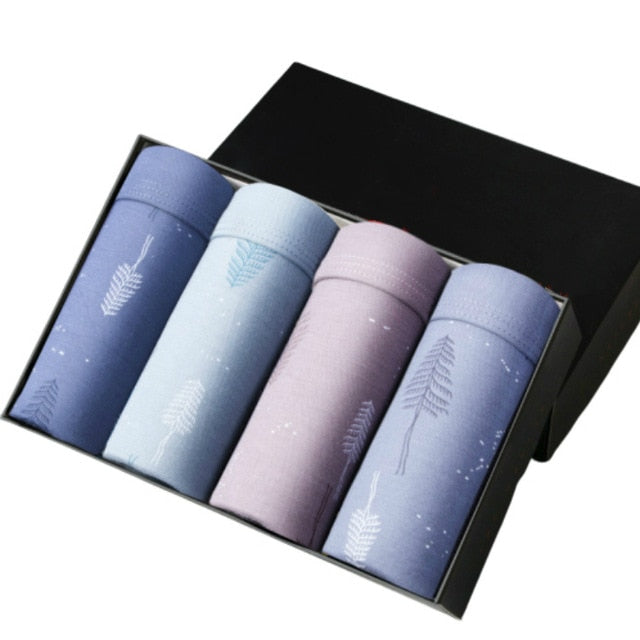 Four-pack men's boxer briefs by The Clothing Company Sydney, soft breathable U-convex design with printed patterns and trunk style.