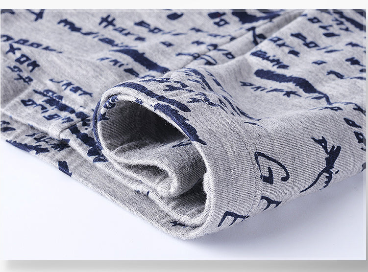 Four pairs of The Clothing Company Sydney men's boxer briefs with U convex design, printed breathable underpants, and soft fabric.