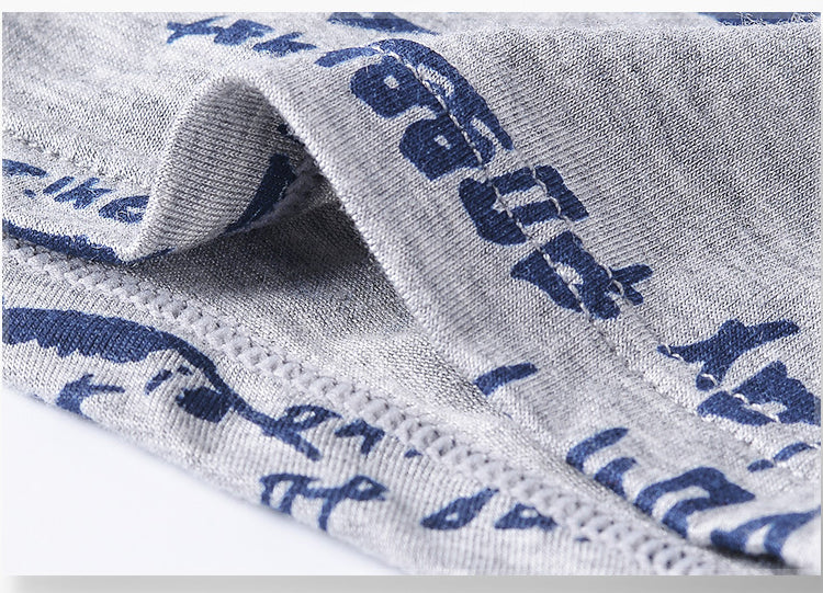 Four-pack men's boxer underwear from The Clothing Company Sydney, breathable U convex trunks with printed design.