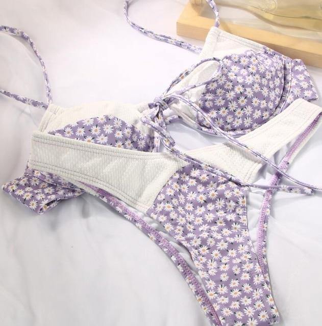 Deep V neck floral print bikini swimsuit with bow detail, lace-up design, from The Clothing Company Sydney.