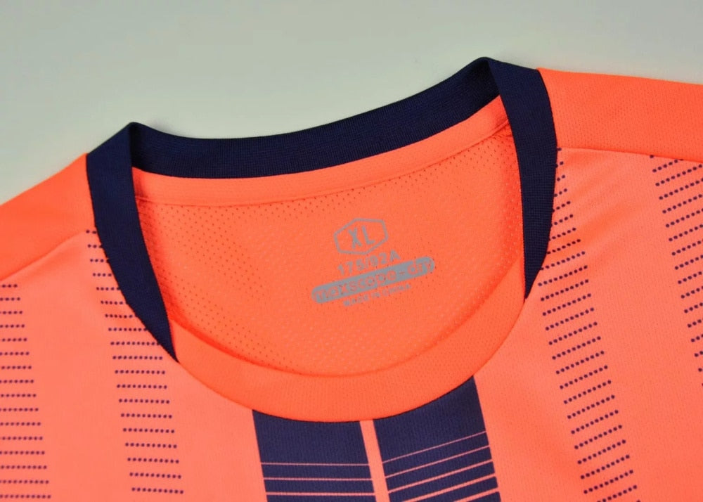 Adults and kids soccer football shorts from The Clothing Company Sydney, shown as part of a matching uniform set.