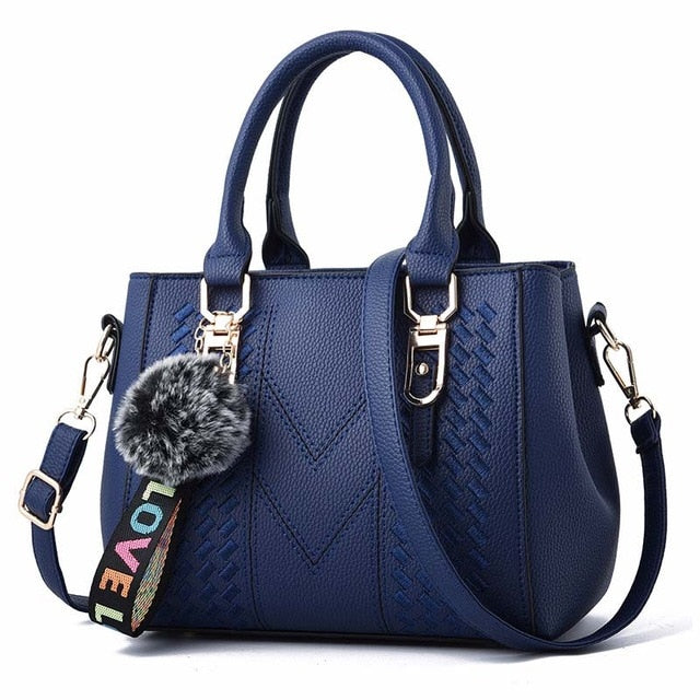 Embroidery handbag with fur ball, PU leather shoulder bag, crossbody tote, female purse, office-friendly designer bag.