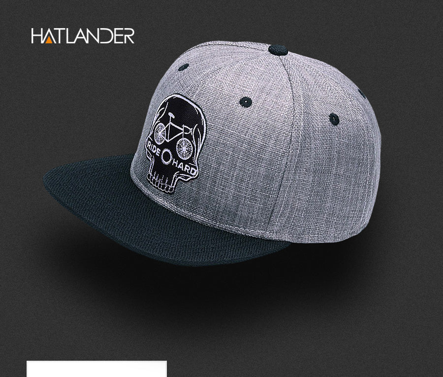 Black baseball snapback hat with skull embroidery, stylish hip-hop cap by The Clothing Company Sydney.