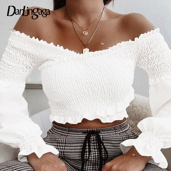 White fashion chic smocking off-shoulder blouse for women with long sleeves and criss-cross design, by The Clothing Company Sydney