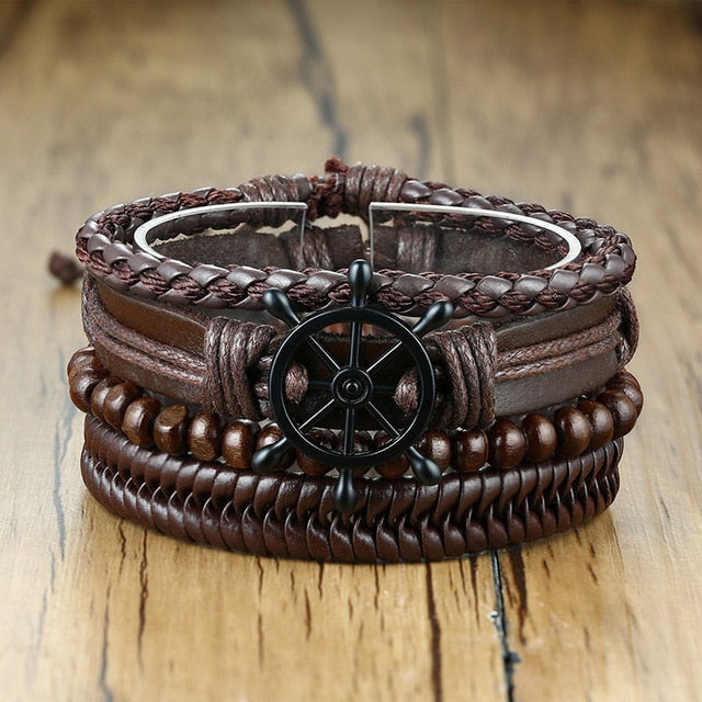 Four braided leather bracelets for men featuring wood beads, tribal charms, and vintage life tree designs.