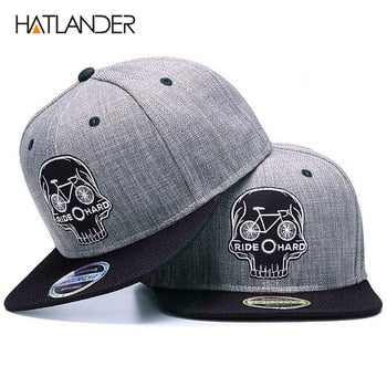 Black baseball snapback hat with embroidered skull design, stylish hip hop accessory by The Clothing Company Sydney