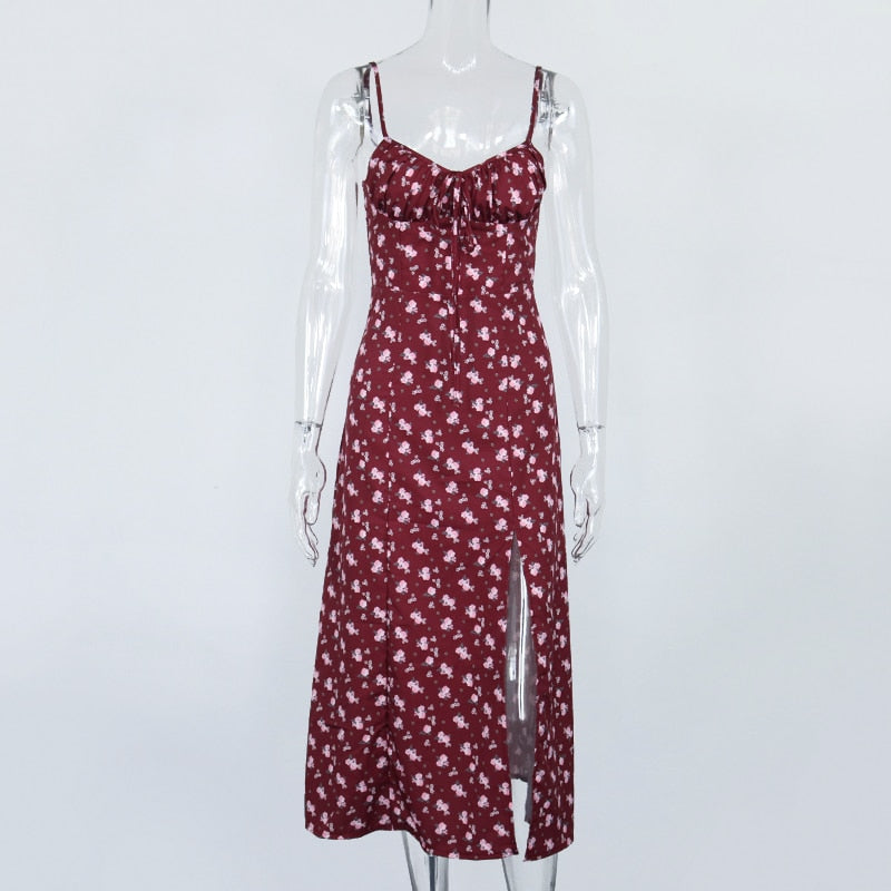 Women’s floral wine-colored prairie chic dress with spaghetti straps, backless design, lace-up side slit, and draped fabric.