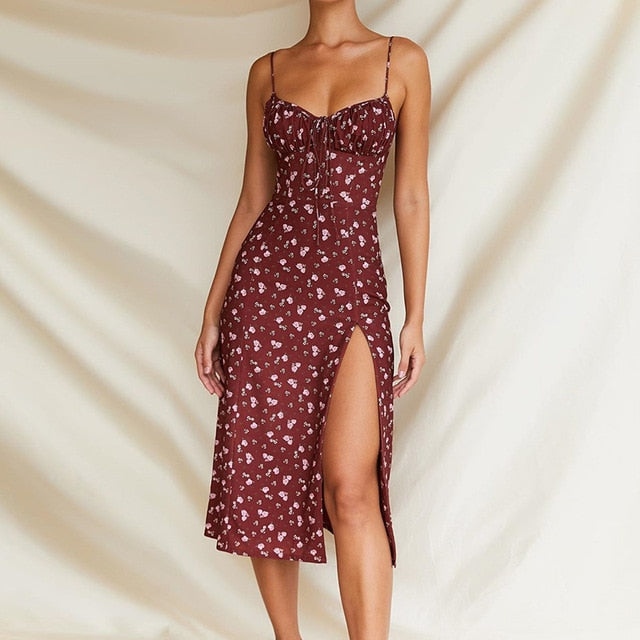 Women’s floral wine-colored prairie chic dress with spaghetti straps, backless design, lace-up side split, long flowing style.