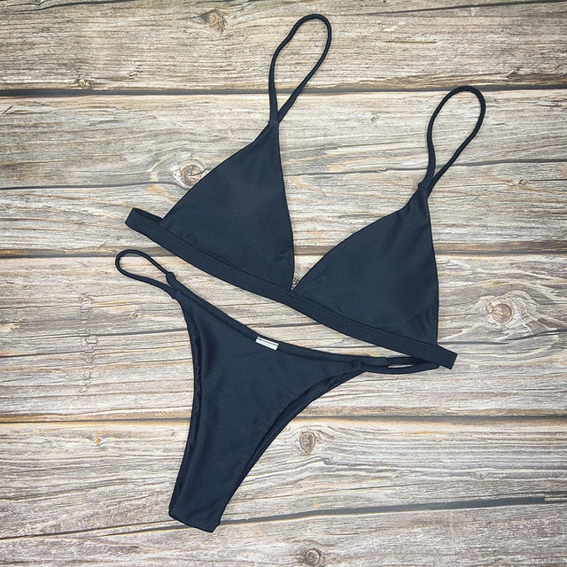 Low-cut two-piece micro bikini in four colors, backless swimwear with push-up design, by The Clothing Company Sydney.