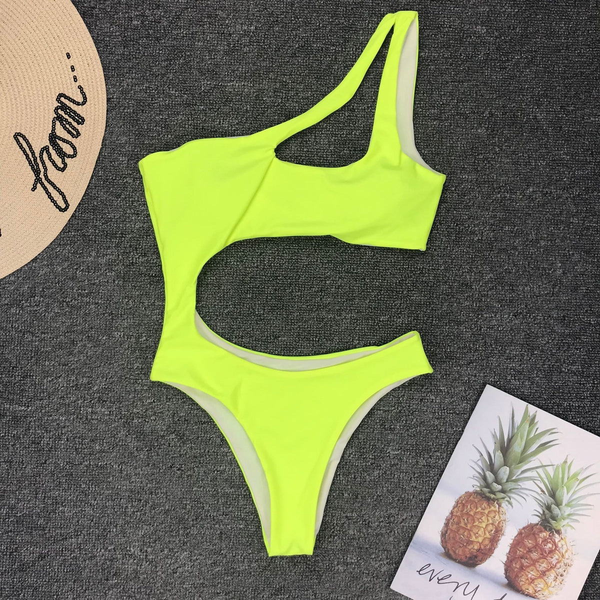 Leopard print one-piece beachwear swimsuit with single shoulder strap and midriff cut, by The Clothing Company Sydney.