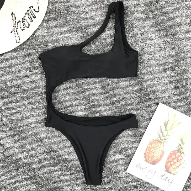 Leopard print one-piece swimsuit with single shoulder strap, midriff cut, from The Clothing Company Sydney.