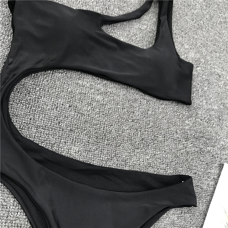 Leopard print one-piece beachwear bikini set with a single shoulder strap and midriff cut, by The Clothing Company Sydney.