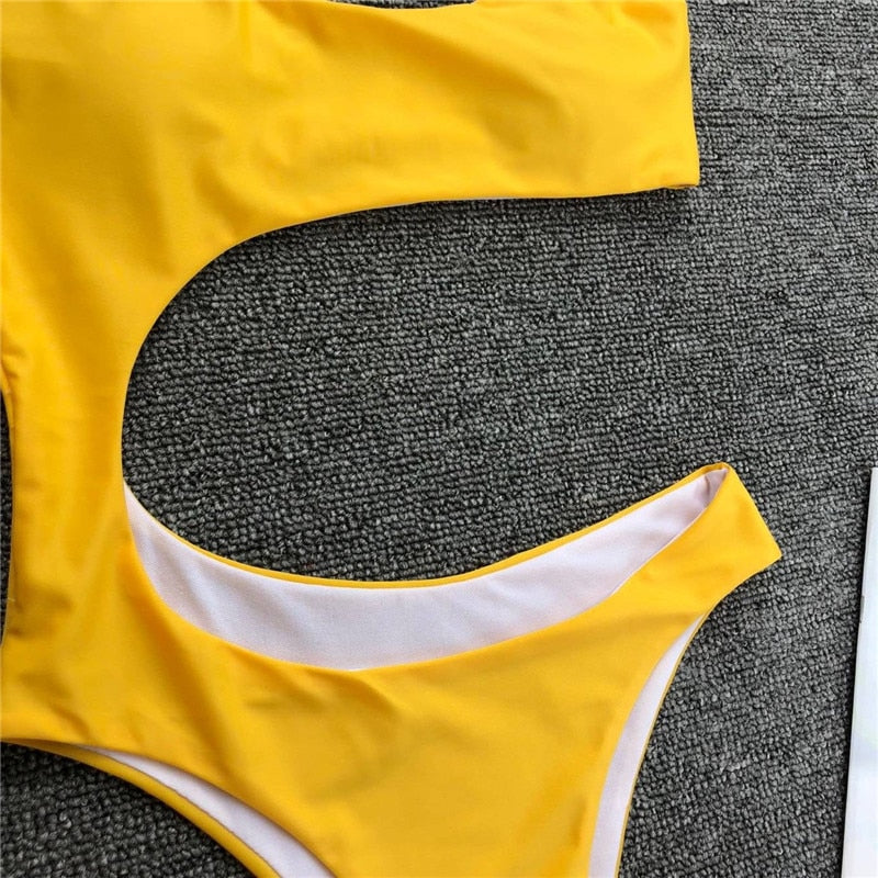 Leopard print one-piece beachwear bikini set with single shoulder strap and midriff cut, by The Clothing Company Sydney.