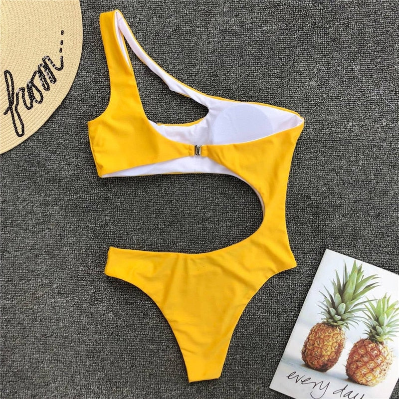Leopard print one-piece beachwear bikini set with single shoulder strap and midriff design, from The Clothing Company Sydney.