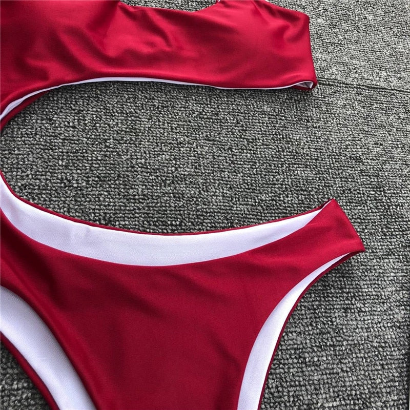 Leopard print one-piece beachwear bikini from The Clothing Company Sydney, featuring a single shoulder design and midriff cutout.