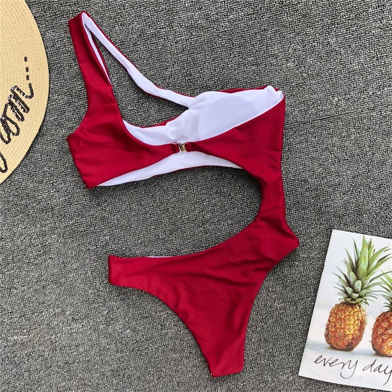 Leopard print one-piece beachwear bikini set with single shoulder strap and midriff design, by The Clothing Company Sydney.