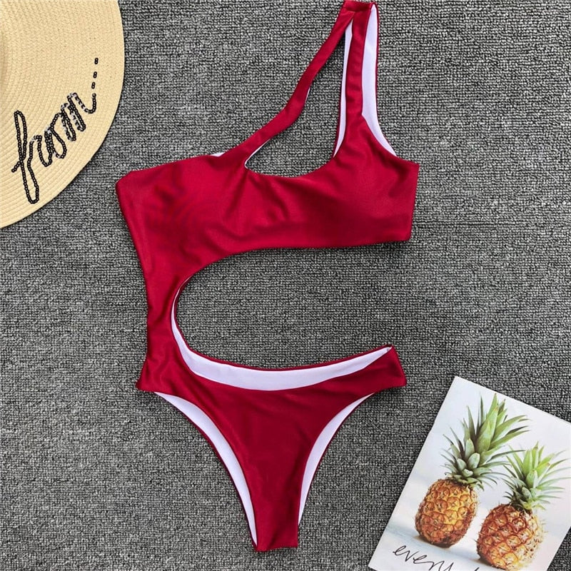 Leopard print one-piece bikini set with single shoulder strap, midriff cut, from The Clothing Company Sydney, perfect for beachwear.