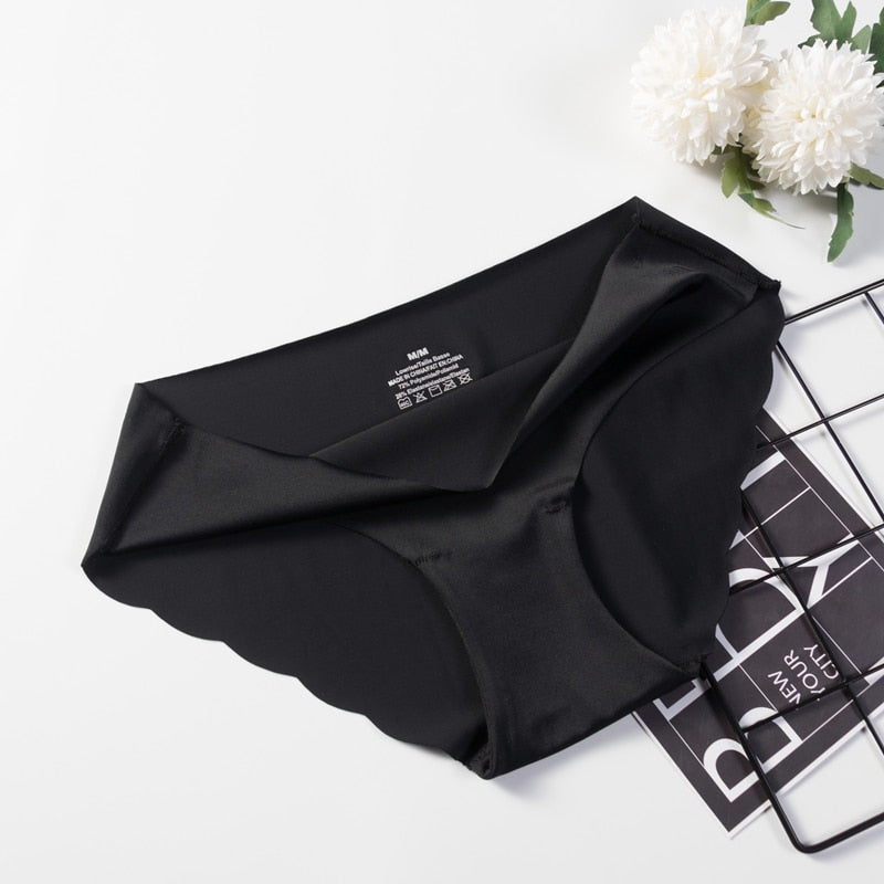 Three-pack of seamless solid color panties from The Clothing Company Sydney, stylish and comfortable women's underwear.