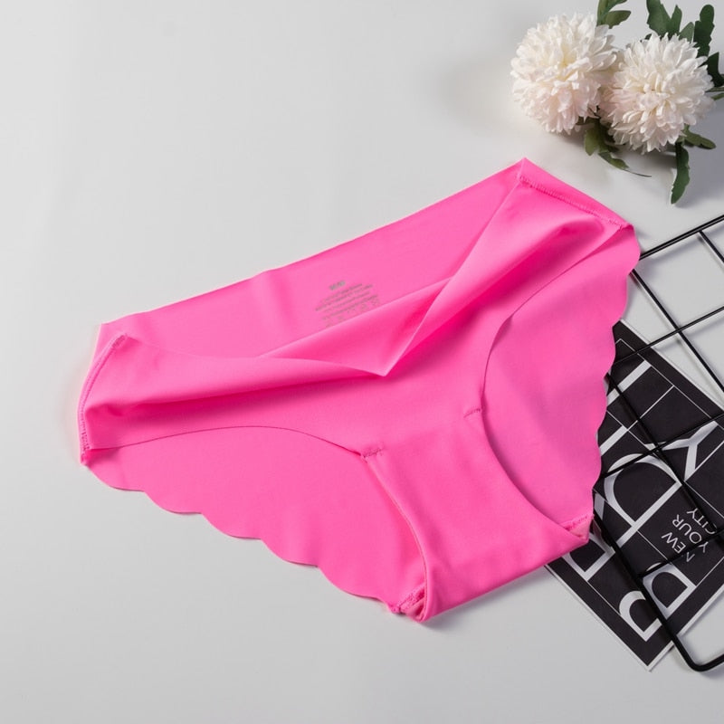 Three-pack of seamless, solid-colored panties from The Clothing Company Sydney, featuring comfortable, sexy brief underwear.