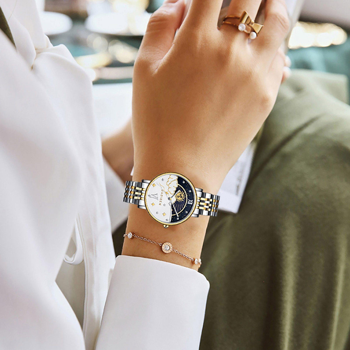 Rose gold women's wristwatch by CADISEN with moon phase dial and luxury design, stylish fashion accessory for women.