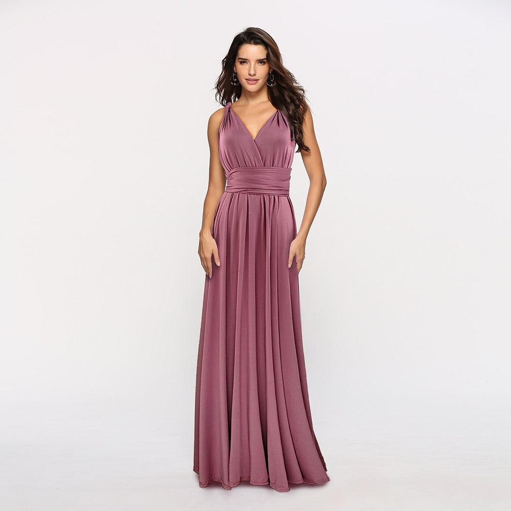 Long boho maxi dress by The Clothing Company Sydney featuring a convertible, multiway design with bandage details and flowing fabric.