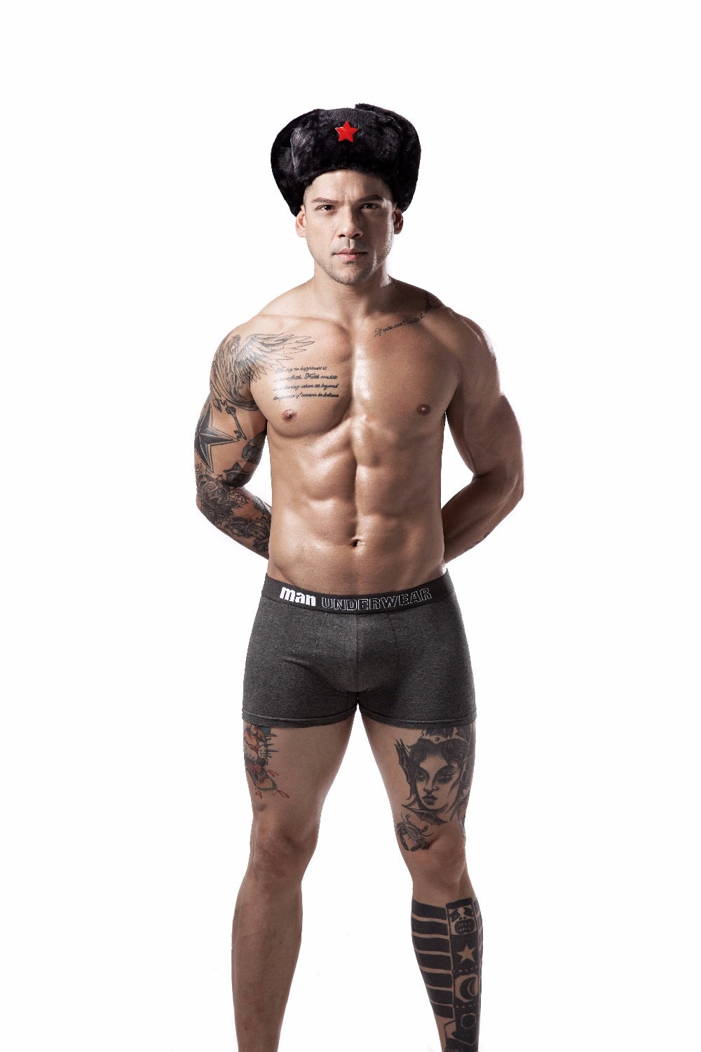 Four pairs of men's cotton boxer briefs, breathable and flexible, in solid colors, from The Clothing Company Sydney.