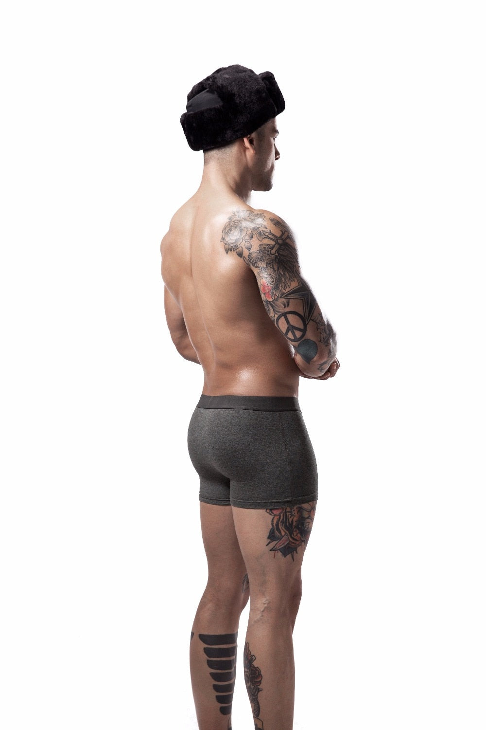 Four pairs of men's breathable cotton boxer briefs with solid colors and flexible fit from The Clothing Company Sydney.