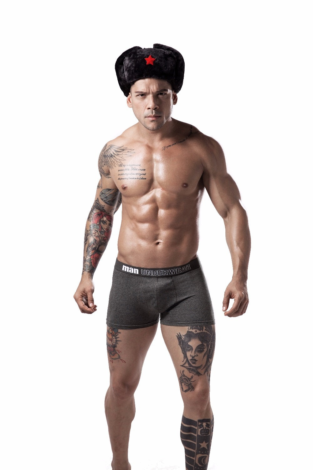 Four men's cotton boxer briefs in solid colors, breathable and flexible, from The Clothing Company Sydney.