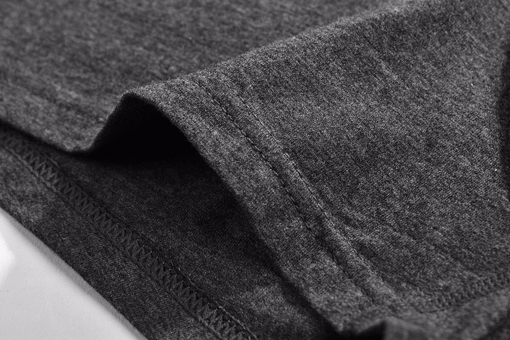 Four pairs of men's cotton boxer briefs from The Clothing Company Sydney, breathable and flexible solid color underpants for men.