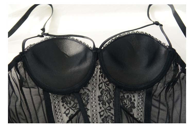 Transparent lingerie set featuring a bustier with cup girdle, straps, and matching G-string from The Clothing Company Sydney.