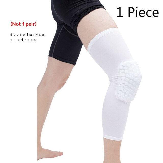 Black basketball knee pads with honeycomb foam padding, compression sleeve, and adjustable straps for sports support and protection.