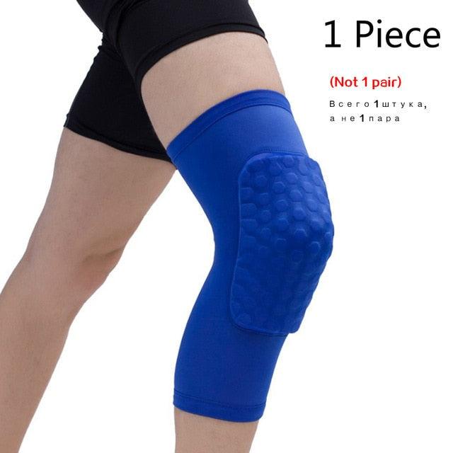Black basketball knee pad with honeycomb foam compression sleeve, designed for sports protection and support during fitness activities.