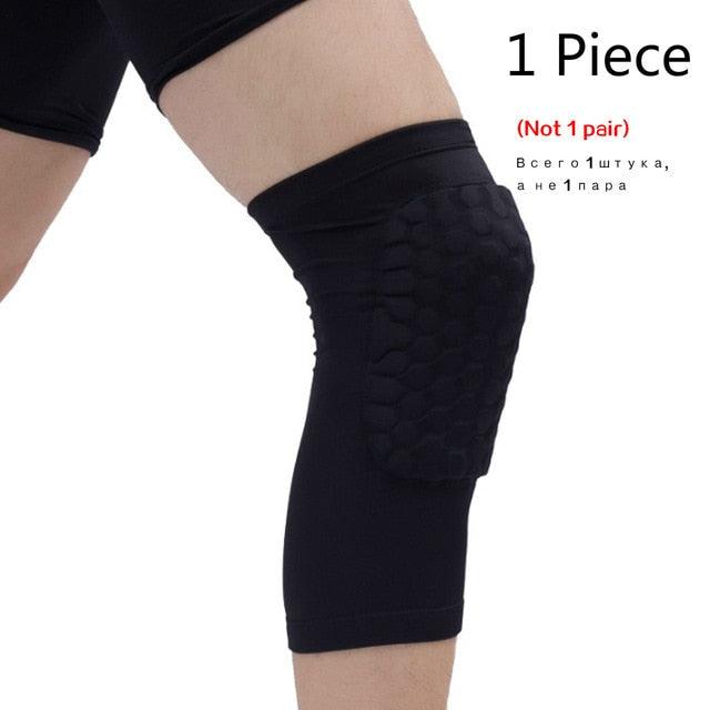 Black basketball knee pads with honeycomb foam compression sleeve and adjustable strap, designed for sports support and protection.