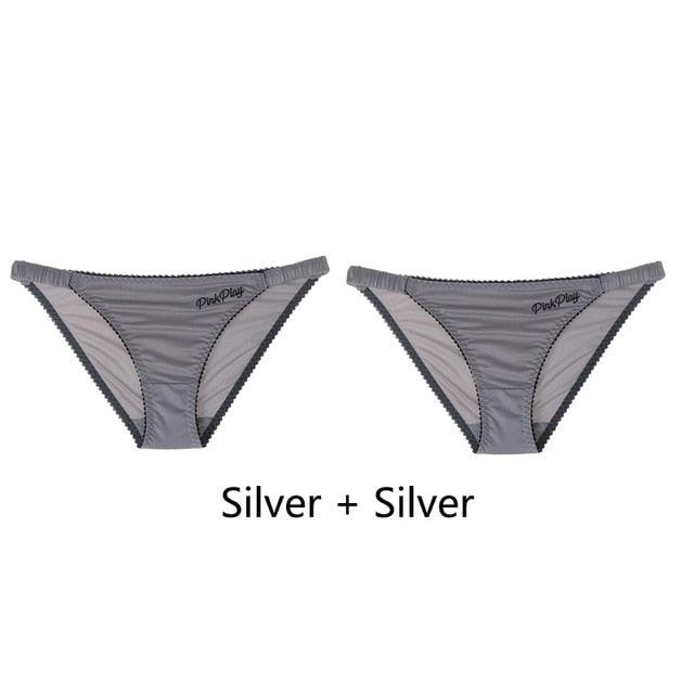 Two pairs of letter print women's seamless low-rise briefs by The Clothing Company Sydney, comfortable and stylish underpants.