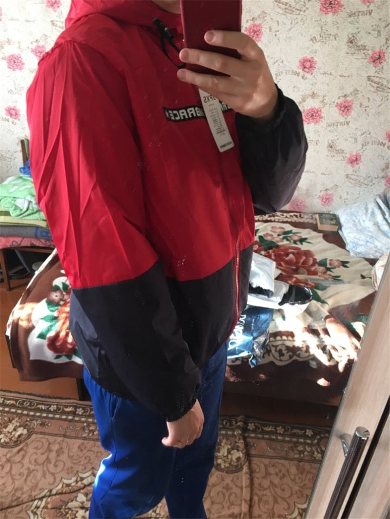 Men's all-weather casual jacket by The Clothing Company Sydney with patchwork design, slim fit, hood, zipper, windbreaker style.