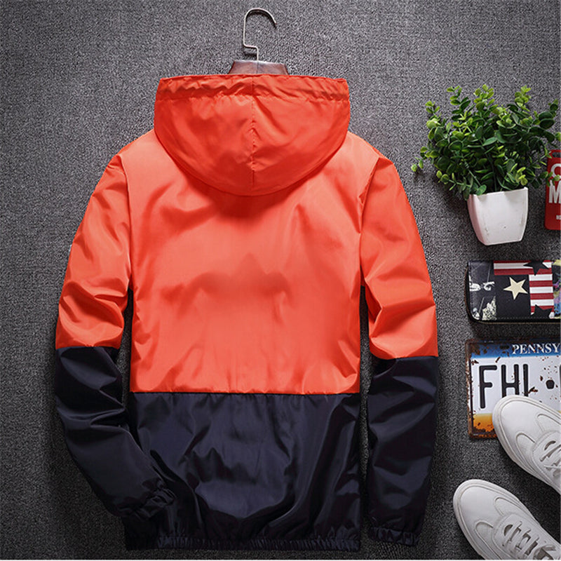 Men's all-weather casual jacket by The Clothing Company Sydney with patchwork design, hood, slim fit, and zipper windbreaker style.