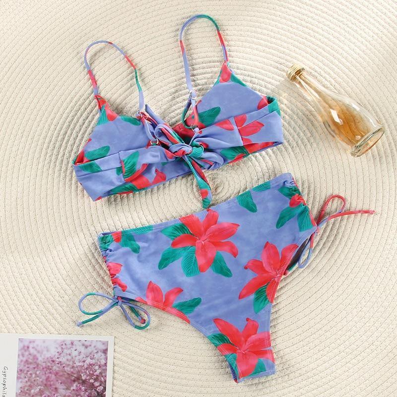 Deep V neckline floral print bikini swimsuit with bow detail and lace-up design, by The Clothing Company Sydney.