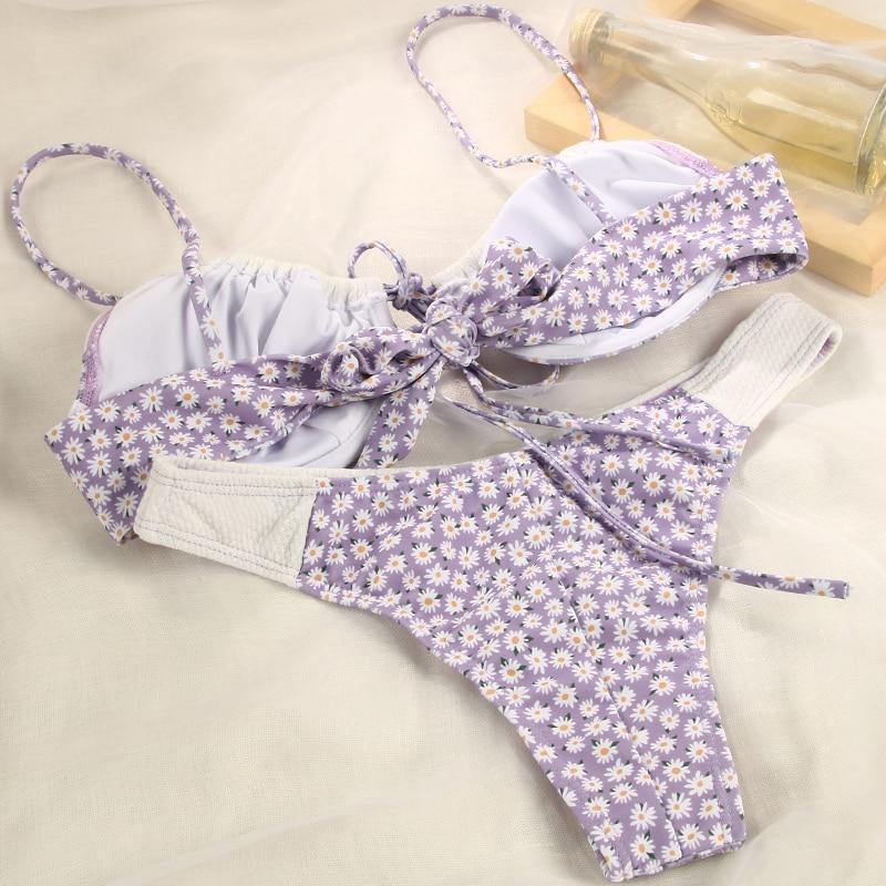 Deep V neck floral print bikini swimsuit with bow detail and lace-up design, by The Clothing Company Sydney