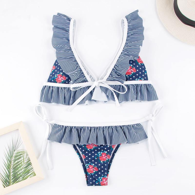 Deep V neck floral print bikini swimsuit with bow and lace-up design, stylish swimwear by The Clothing Company Sydney.