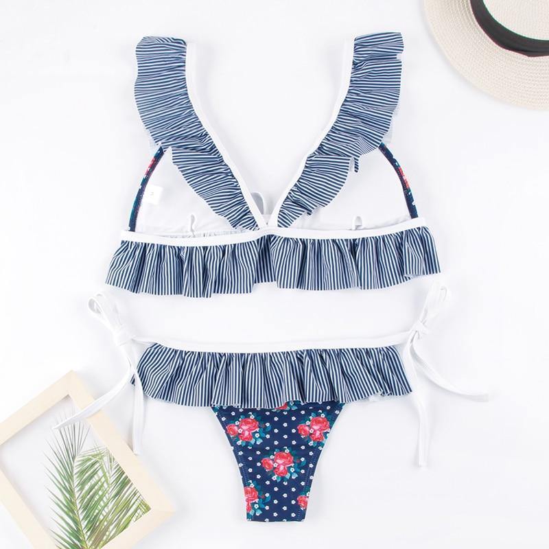 Deep V neck floral print bikini from The Clothing Company Sydney featuring a bow and lace-up design for stylish swimwear.