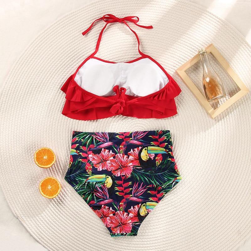 Deep V neck floral print bikini set by The Clothing Company Sydney featuring a bow, lace-up design, and stylish swimwear look