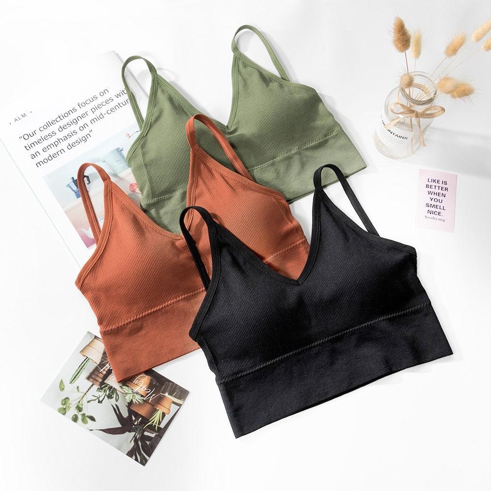 Two seamless U-type backless bras from The Clothing Company Sydney, wire-free bralettes with push-up and no underwire design.