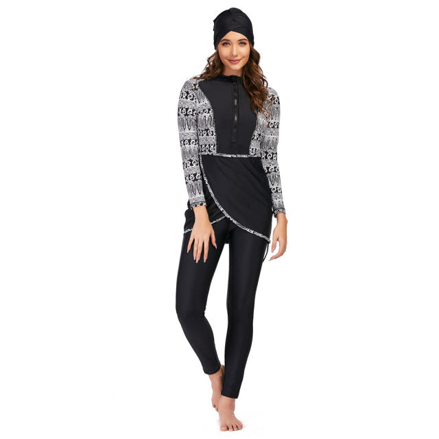 Three-piece full-body swimwear by The Clothing Company Sydney featuring long sleeves and a conservative swimsuit design.