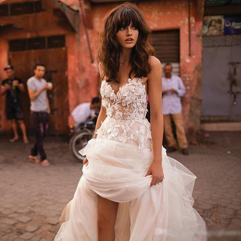 Boho princess wedding gown with sweetheart neckline, floral appliqués, tulle backless A-line silhouette, by The Clothing Company Sydney
