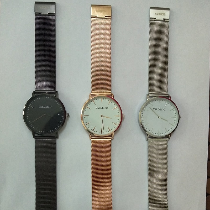 Custom watch face with personalized branding, 50-piece set from The Clothing Company Sydney, ideal for creating private label watches.