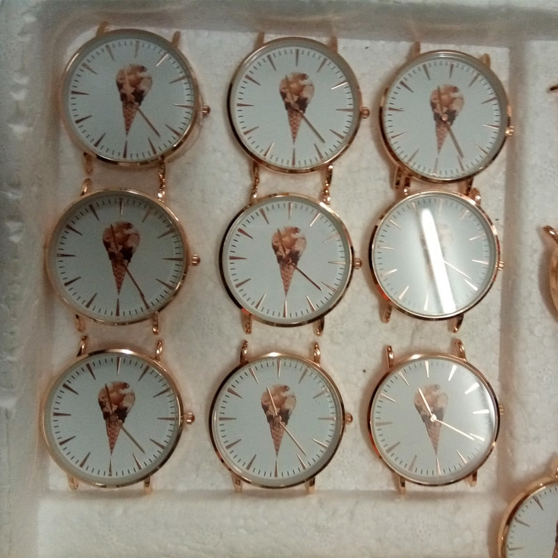 50-piece set of customizable watch faces by The Clothing Company Sydney for creating personalized branded watches.