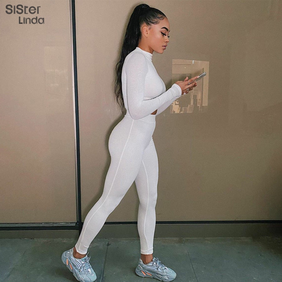 The Clothing Company Sydney fitness activewear set with long sleeve tops and matching leggings for women, perfect for workouts.