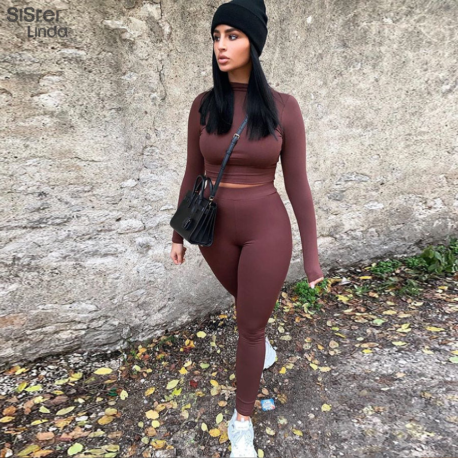 Two-piece sporty activewear set from The Clothing Company Sydney with long sleeve tops and matching leggings for workout fitness.