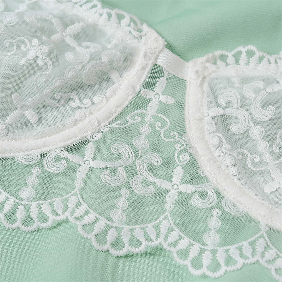 White embroidery lingerie set featuring a half cup underwire bra and matching underwear, elegant and feminine for special occasions.