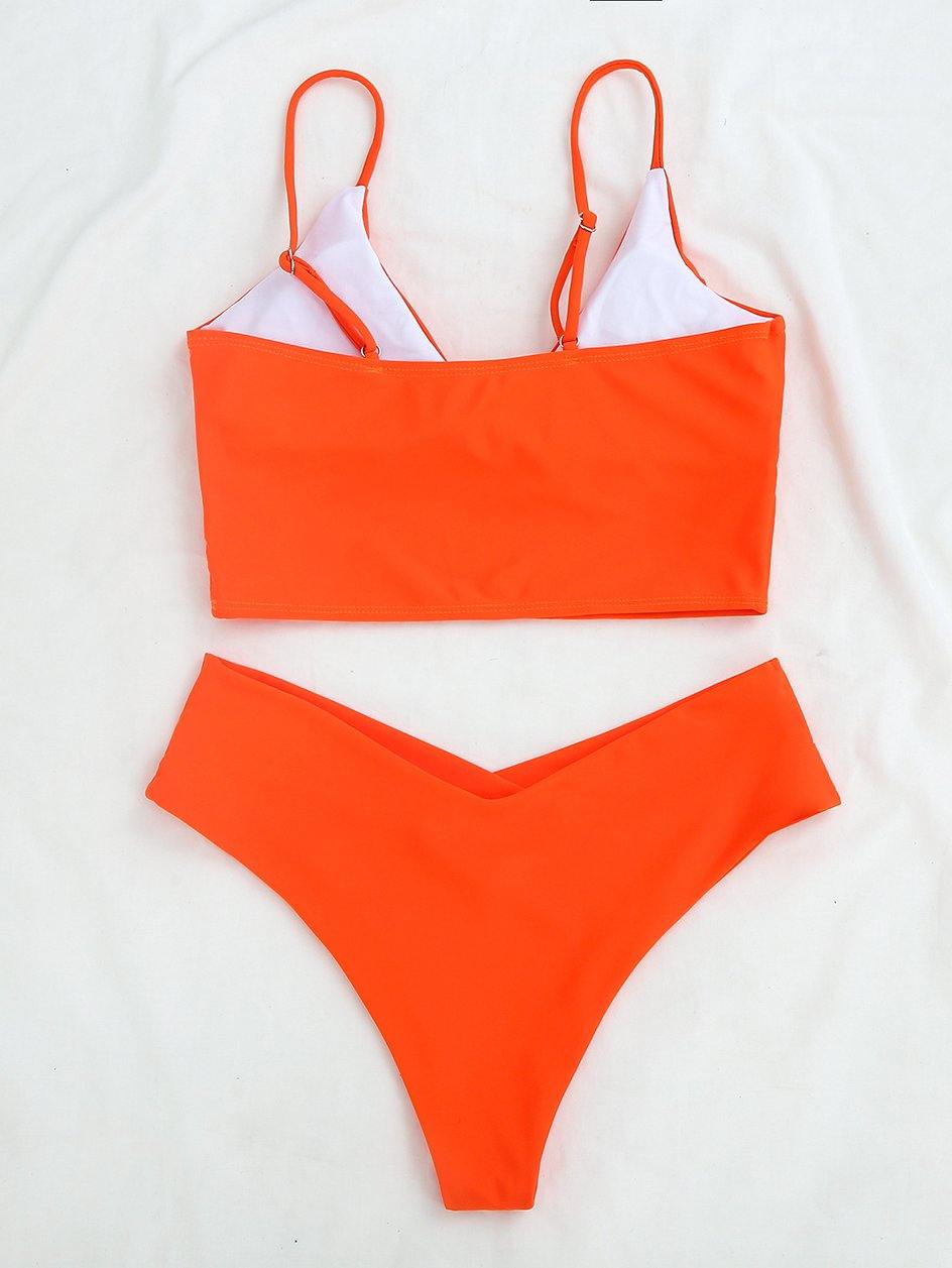 High waist swimsuit by The Clothing Company Sydney featuring a high cut, thong bikini style in vibrant swimwear fabric.